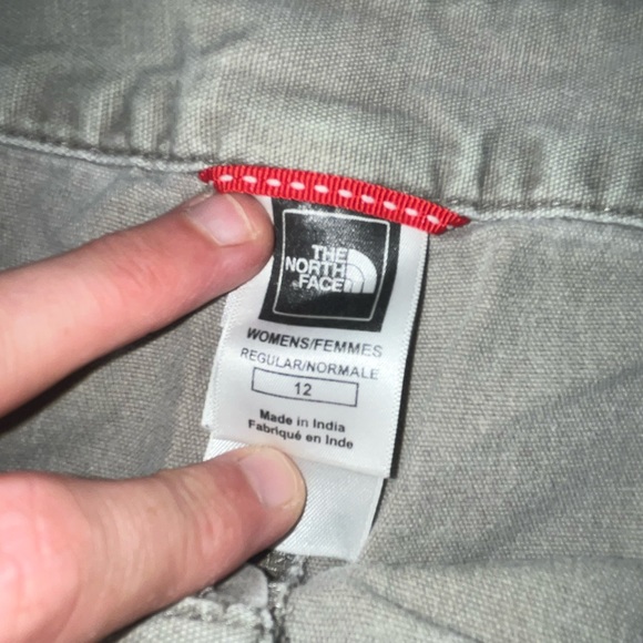 North Face cargo shorts size 12. Inseam-5”, Length-16”, Waist-16”. Gently worn. - Picture 2 of 3